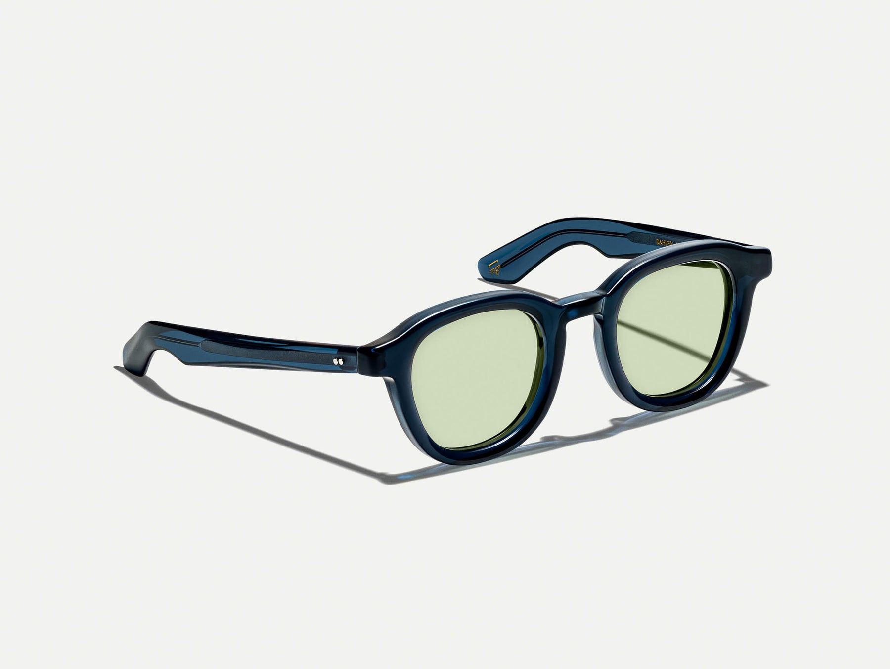 The DAHVEN in Navy with GREEN+ Tint
