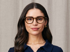 Model is wearing The DAHVEN in size 50 in Olive Brown