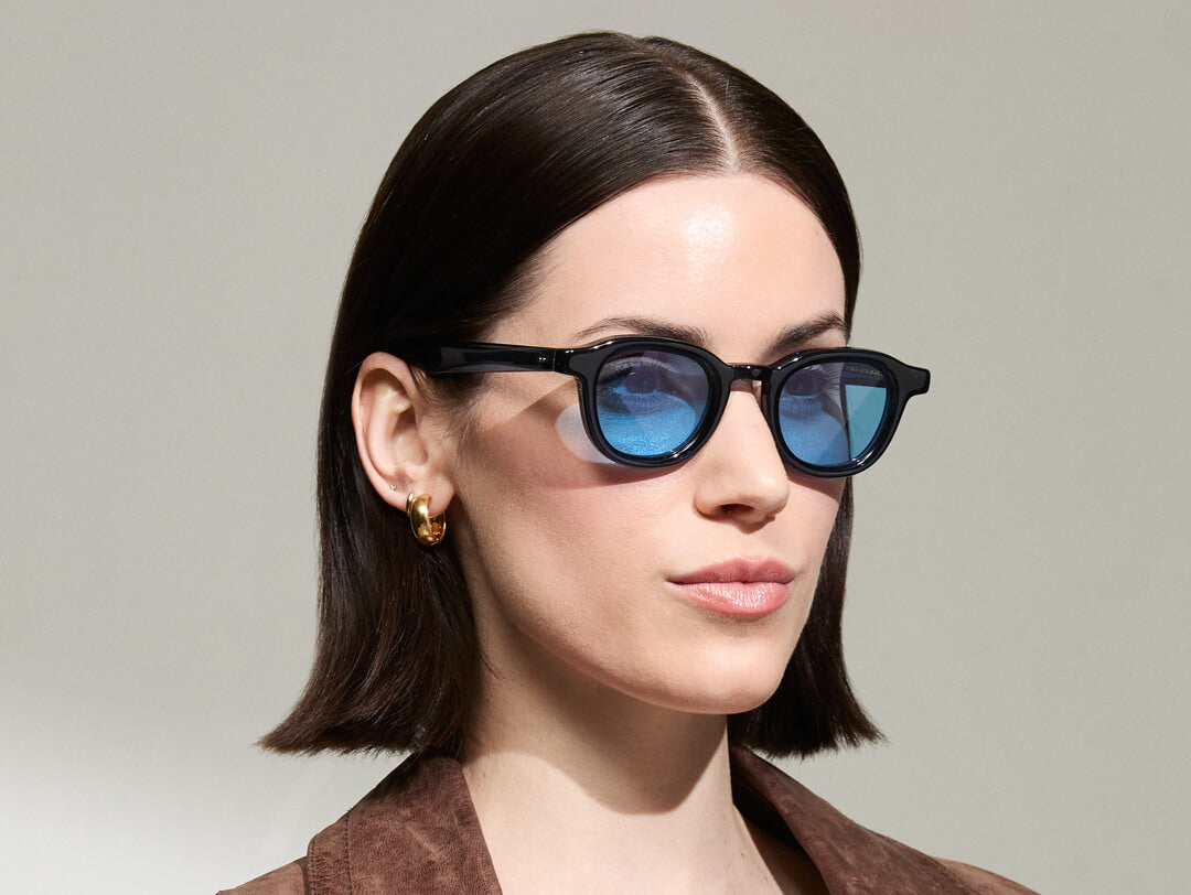Model is wearing The DAHVEN in Navy in size 44 with Celebrity Blue Tinted Lenses