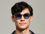 Model is wearing The DAHVEN in Sapphire in size 47 with Denim Blue Tinted Lenses