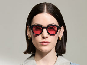 Model is wearing The DAHVEN in Navy size 47 with ROSE+ Tinted Lenses