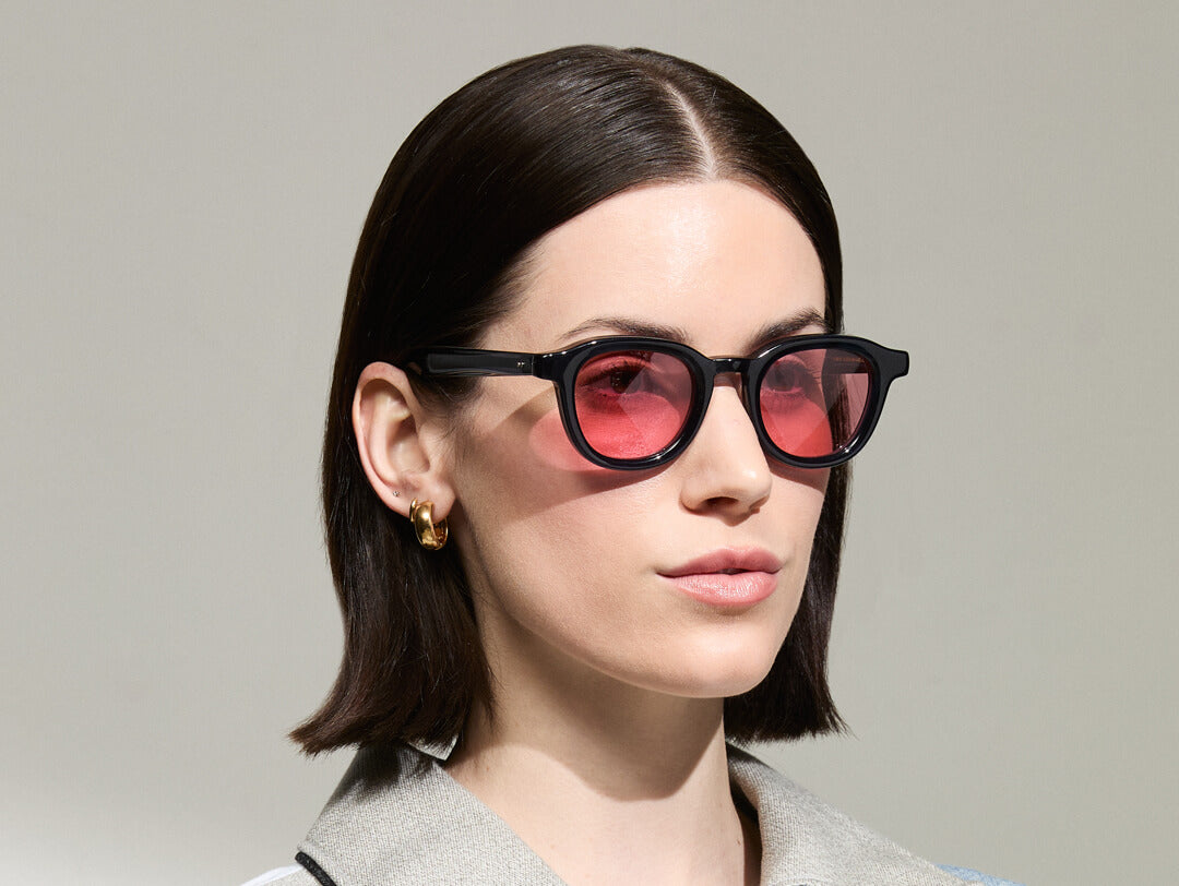 Model is wearing The DAHVEN in Navy size 47 with ROSE+ Tinted Lenses