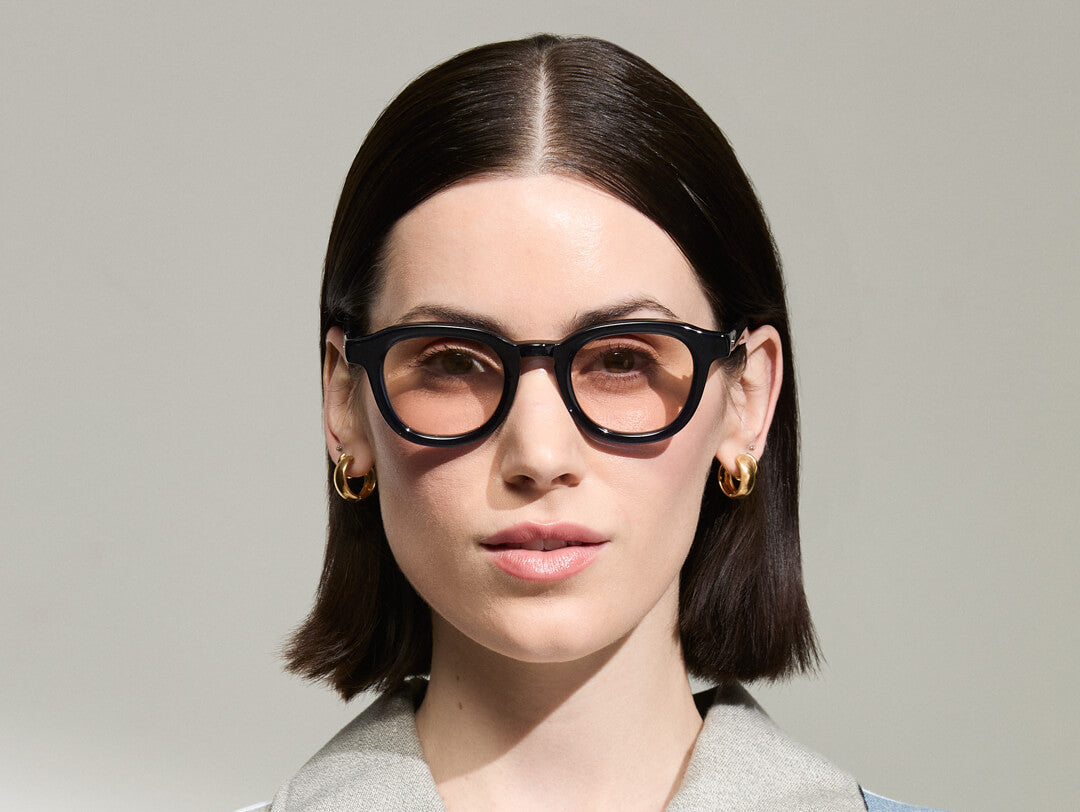 Model is wearing The DAHVEN in Navy size 47 with ROSE+ Tinted Lenses