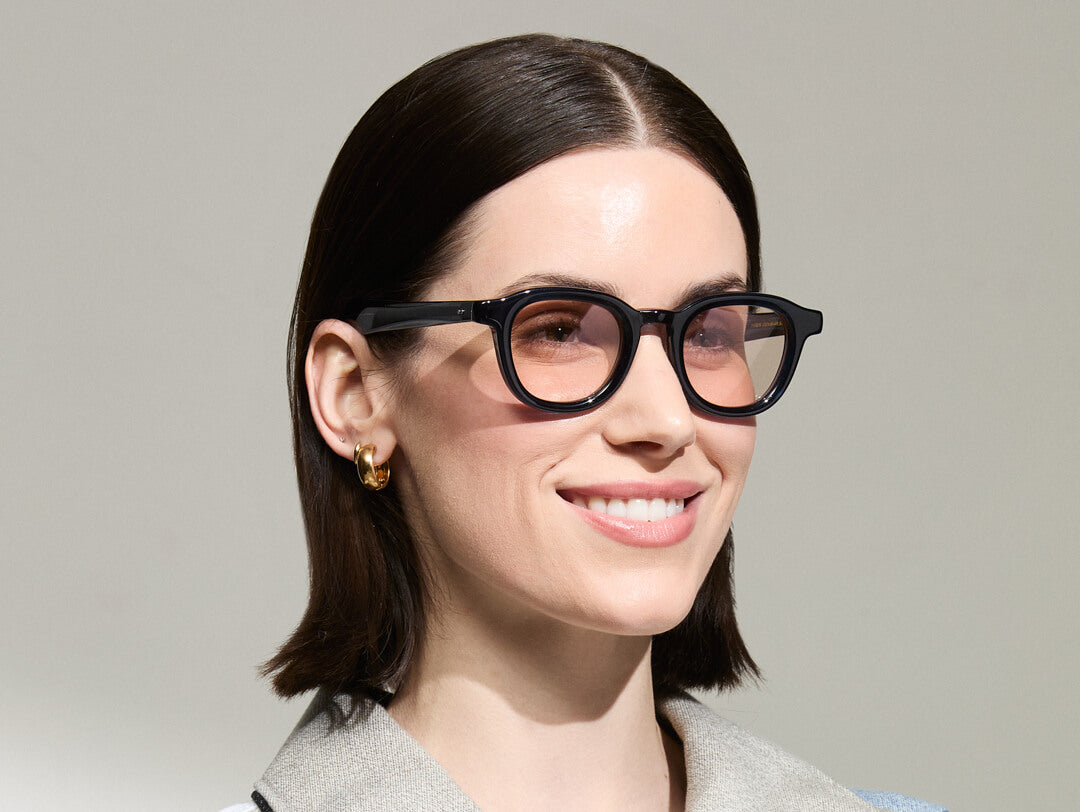 Model is wearing The DAHVEN in Navy size 47 with ROSE+ Tinted Lenses