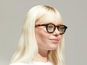 Model is wearing The DAHVEN in Tortoise size 44 with BLUE+ Tinted Lenses