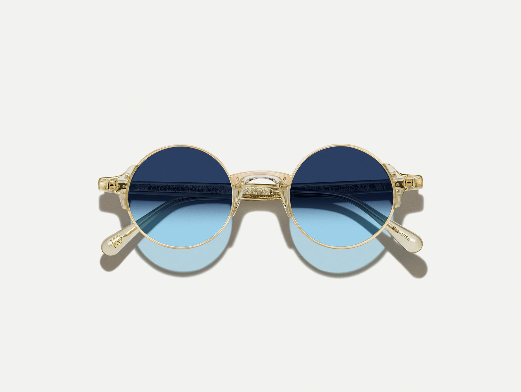 #color_flesh | The DIBBIK SUN in Flesh with Denim Blue Tinted Lenses