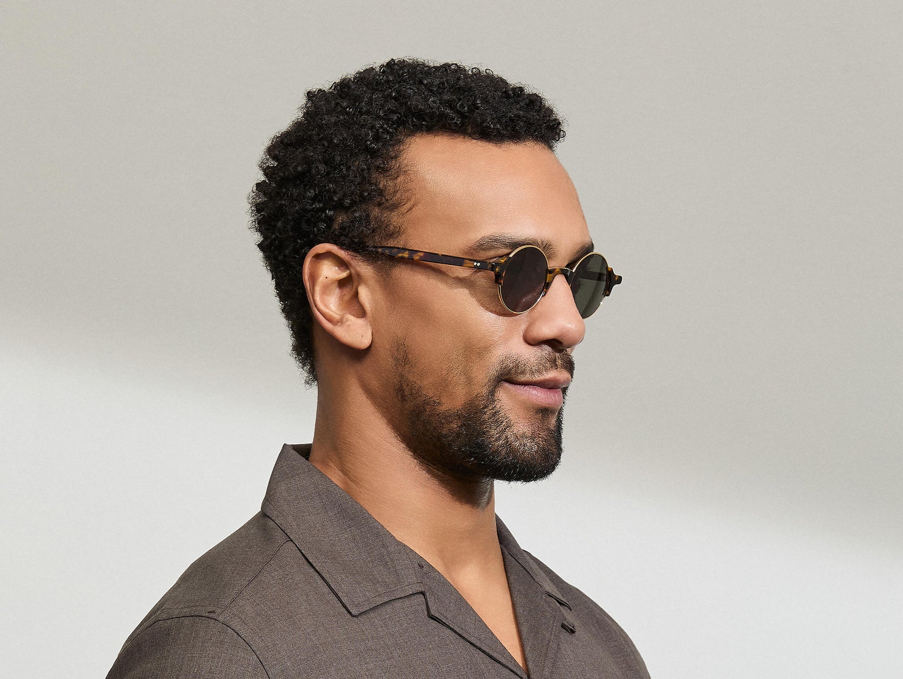 Model is wearing The DIBBIK SUN in size 45 in Tortoise with G-15 Tinted Lenses