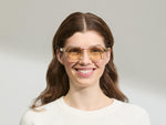 Model is wearing The DOLT in Flesh/Tortoise in size 49 with AMBER+ Lenses