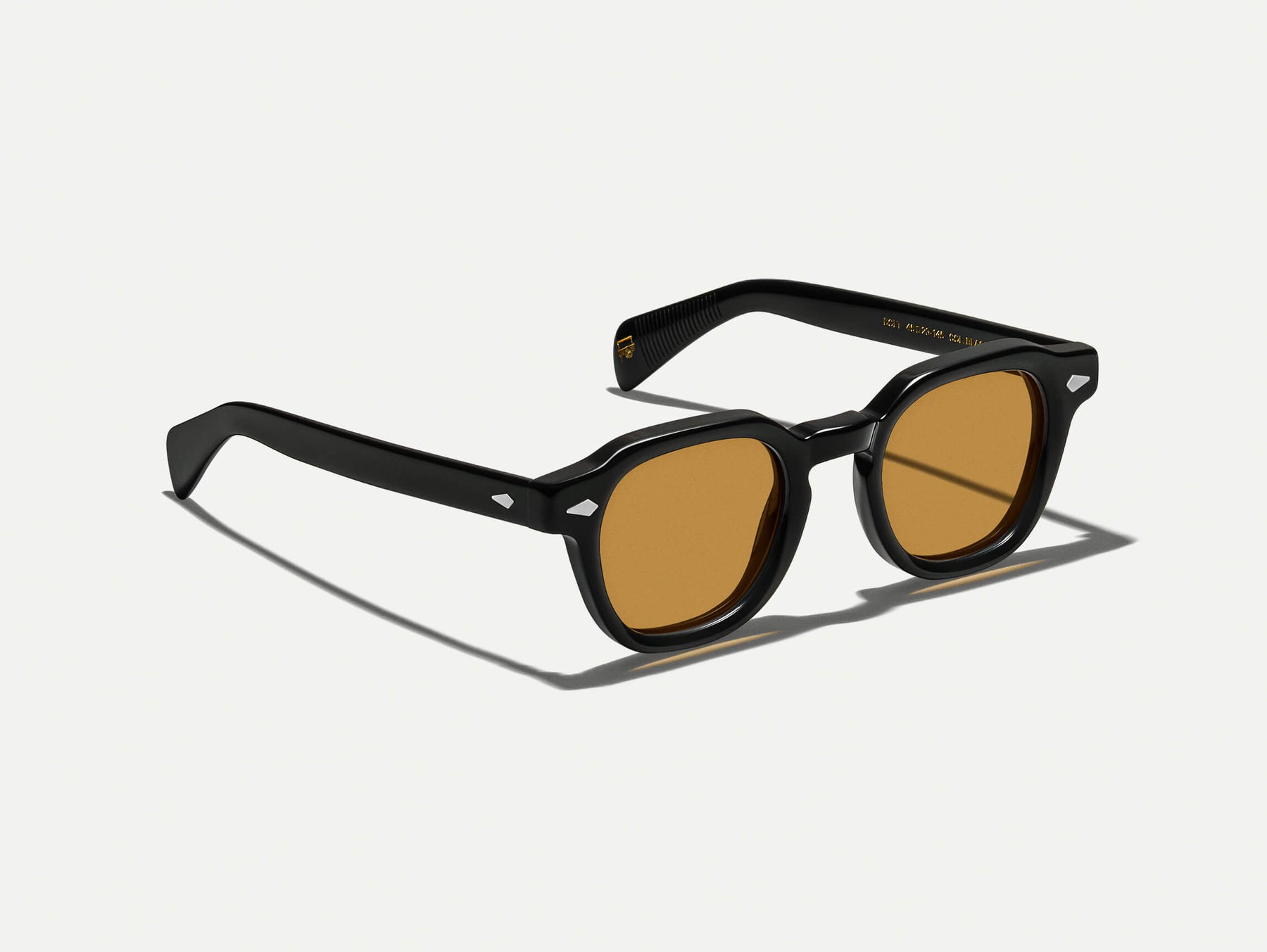 The DOLT in Black with Amber Tinted Lenses