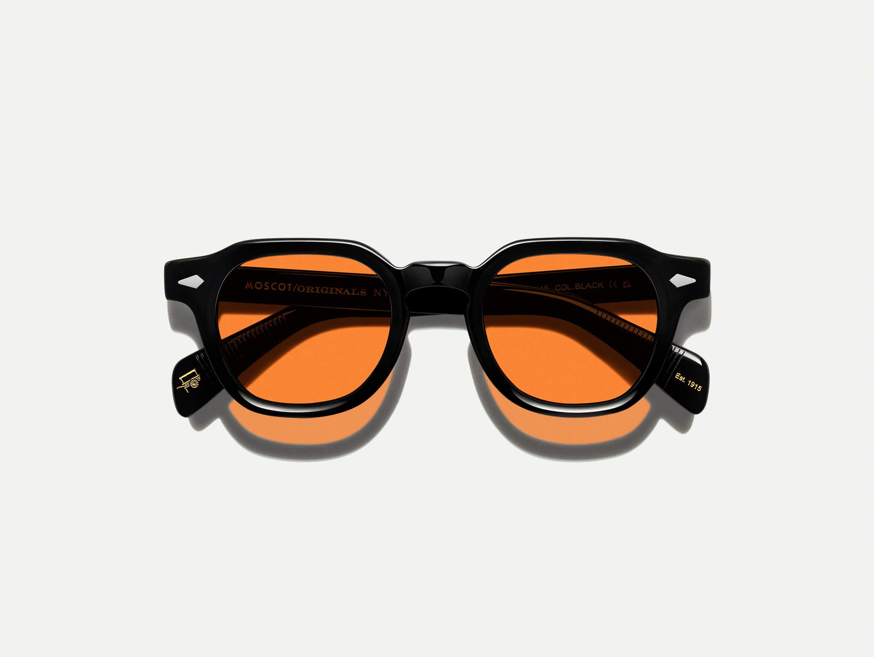 The DOLT Black with Woodstock Orange Tinted Lenses