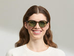 Model is wearing The DOLT in Khaki in size 49 with GREEN+ Lenses