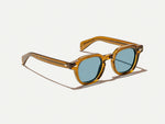 The DOLT SUN in Cognac with Mineral Blue Tinted Lenses