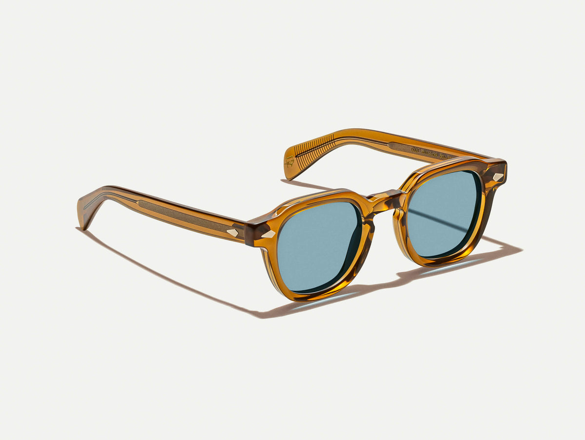 The DOLT SUN in Cognac with Mineral Blue Tinted Lenses