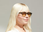 Model is wearing The DOLT SUN in Khaki in size 46 with Chestnut Fade Tinted Lenses