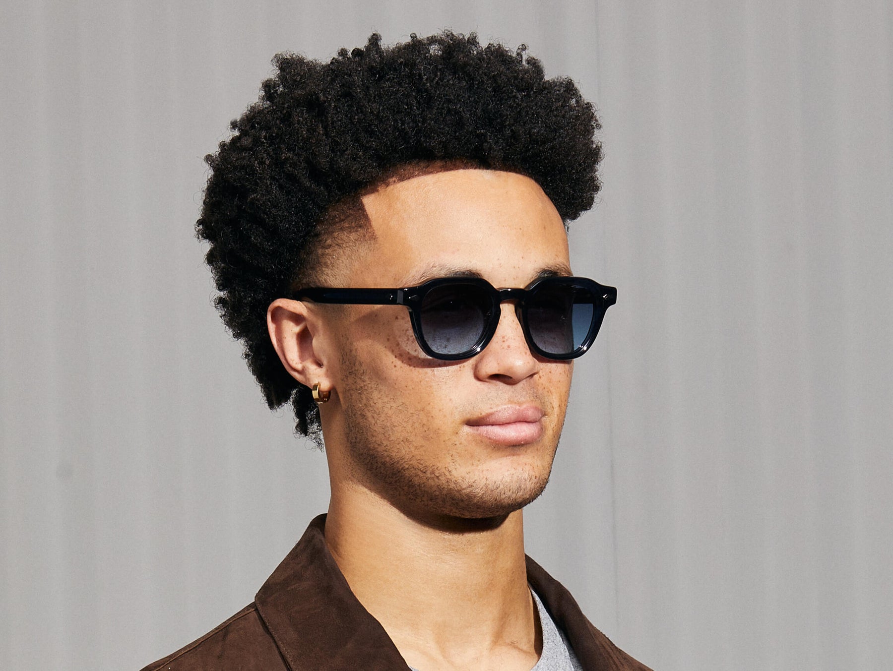 Model is wearing The DOLT SUN in Navy in size 49 with Denim Blue Tinted Lenses