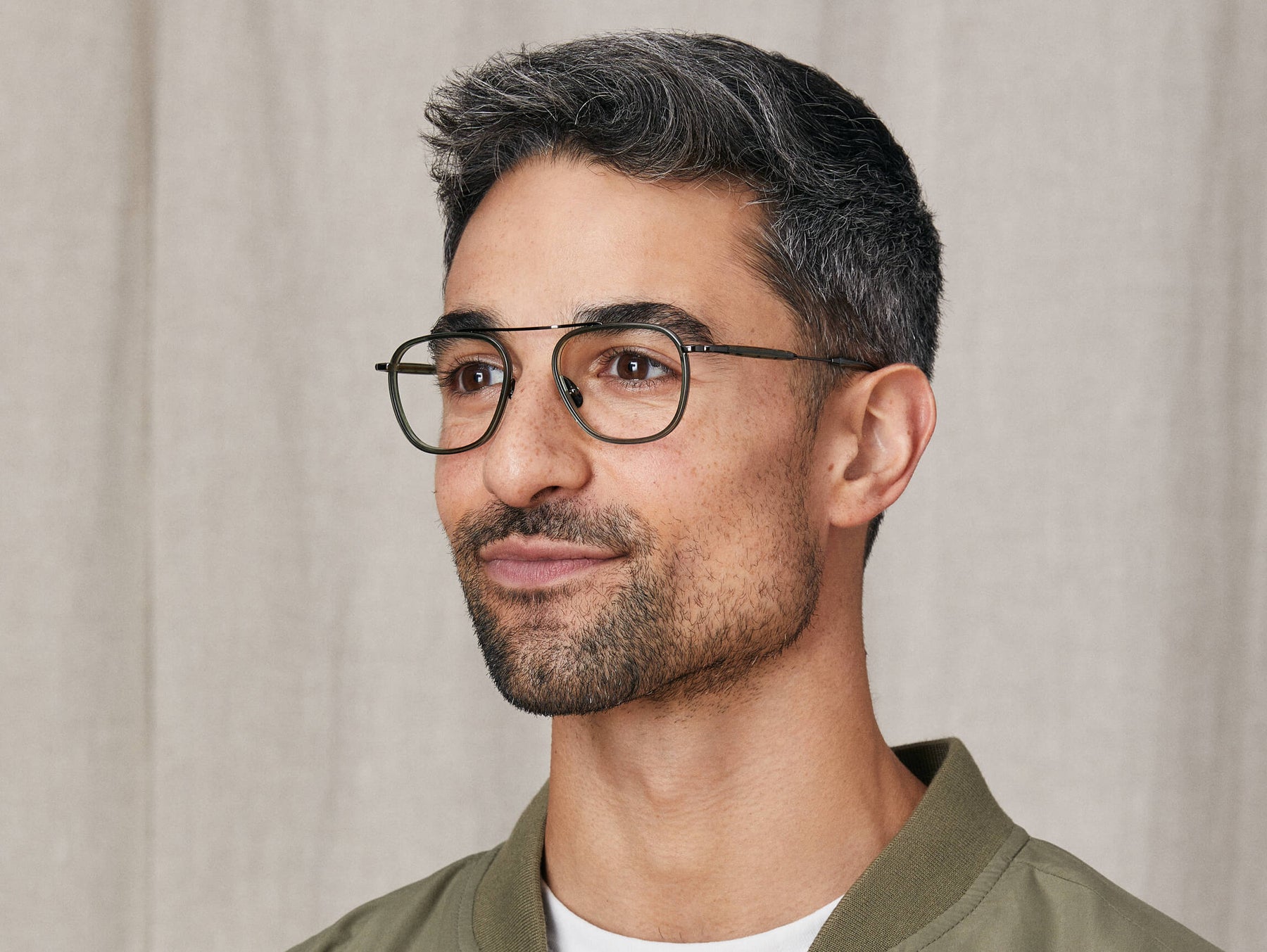 Model is wearing The FANAGLE in size 50 in Pine