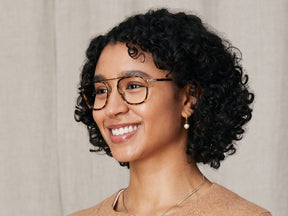 Model is wearing The FANAGLE in size 53 in Tortoise