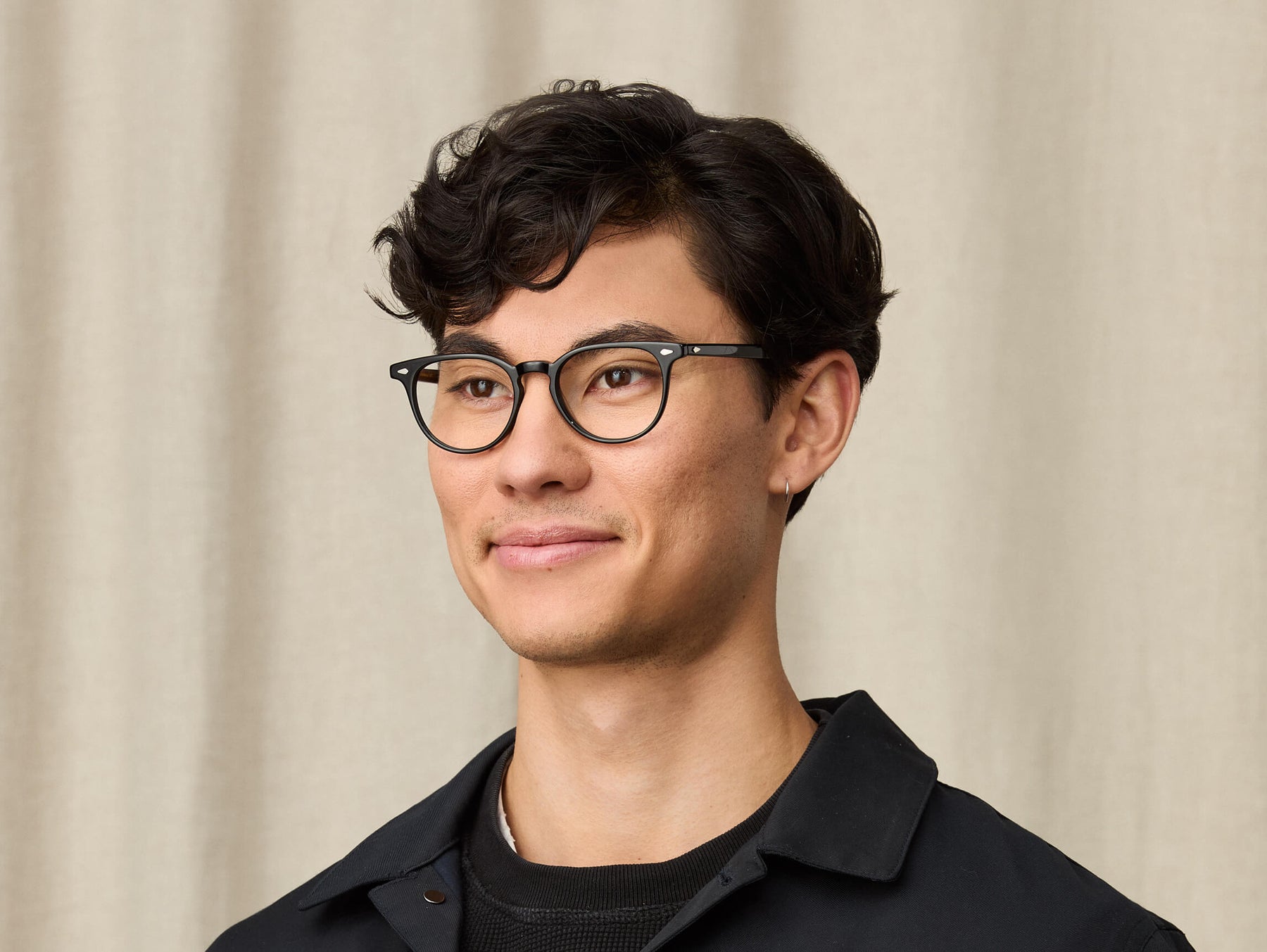 Model is wearing The FEVEL in size 49 in Black