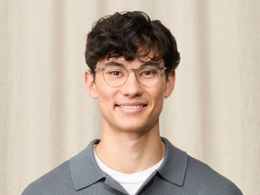 Model is wearing The FEVEL in size 49 in Light Grey