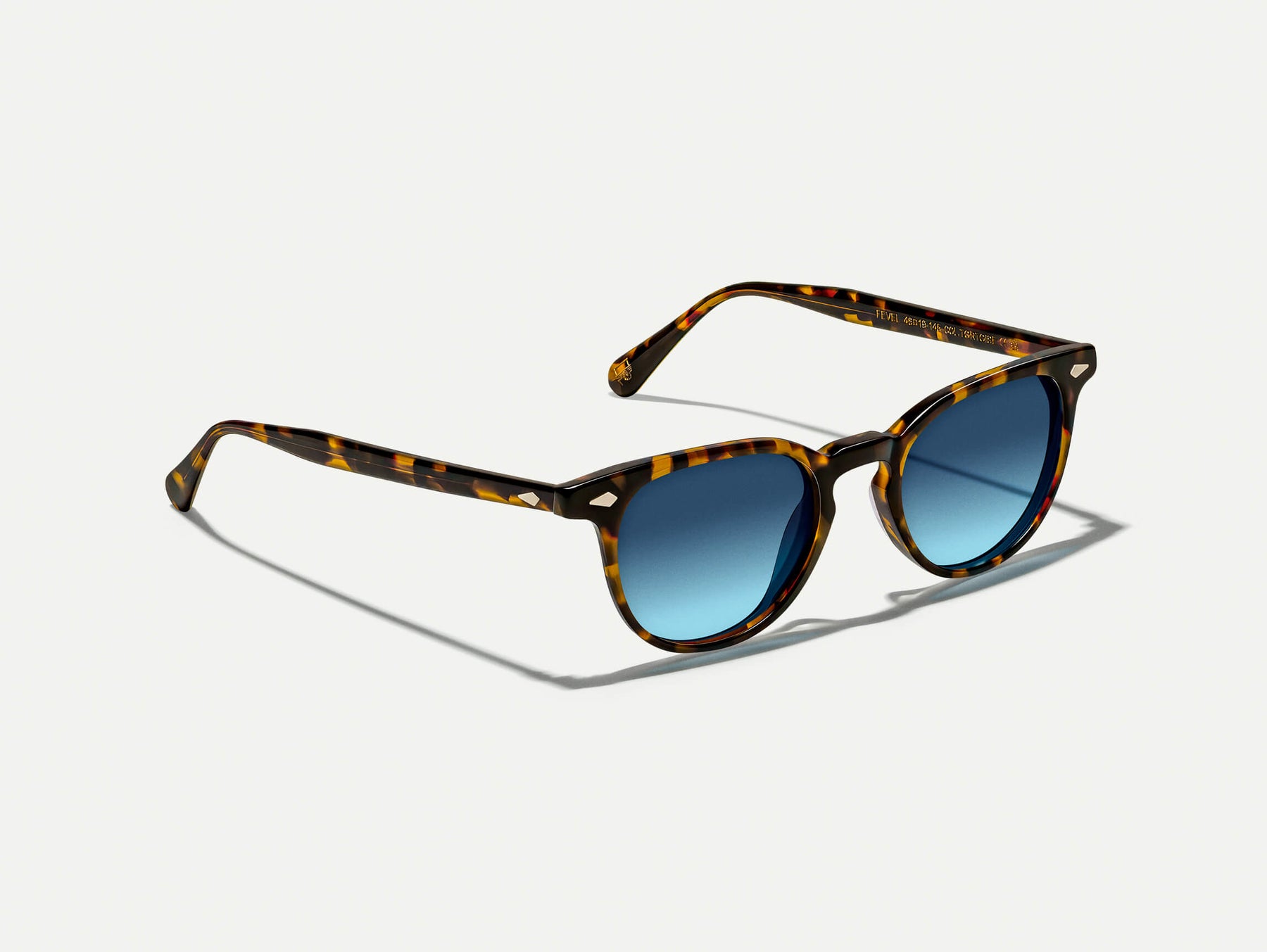 The FEVEL SUN in Tortoise with Denim Blue Tinted Lenses