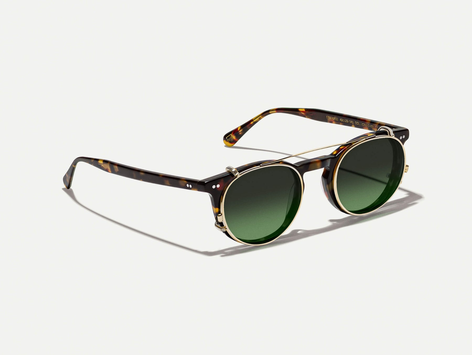 The FRANKIE CLIP  in Gold with Forest Wood Tinted Lenses