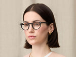 Model is wearing The FRANKIE in size 48 in Matte Black