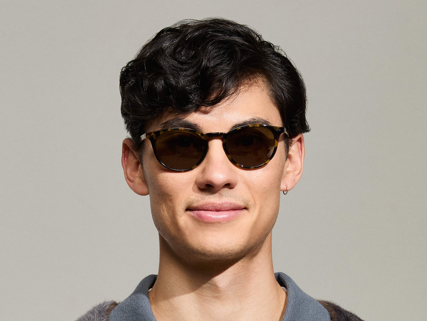 Model is wearing The FRANKIE SUN in Tortoise in size 51 with Ever Green Tinted Lenses