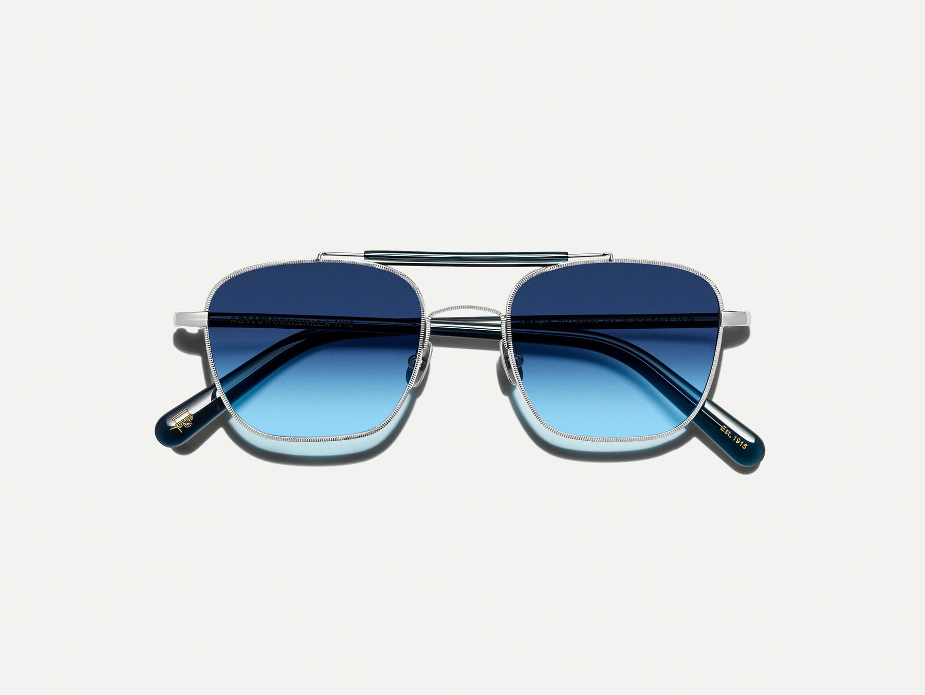 The GAFILTA SUN in Silver/Navy with Denim Blue Tinted Lenses