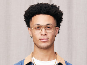 Model is wearing The GAFILTA in size 54 in Antique Gold/Bamboo