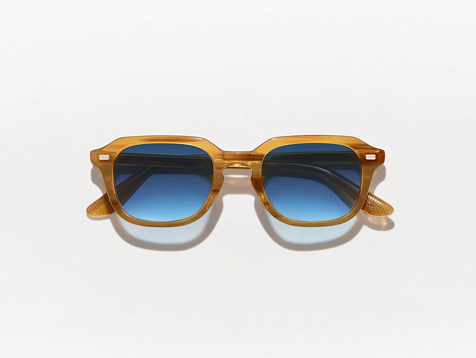 The GATKES SUN in Blonde with Denim Blue Tinted Lenses