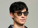 Model is wearing The GAVOLT SUN in Classic Havana in size 48 with Forest Wood Tinted Lenses