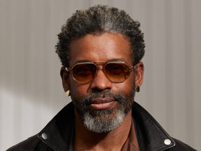 Model is wearing The GAZEEKTAL SUN in Cinnamon in size 55 with Chestnut Fade Tinted Lenses