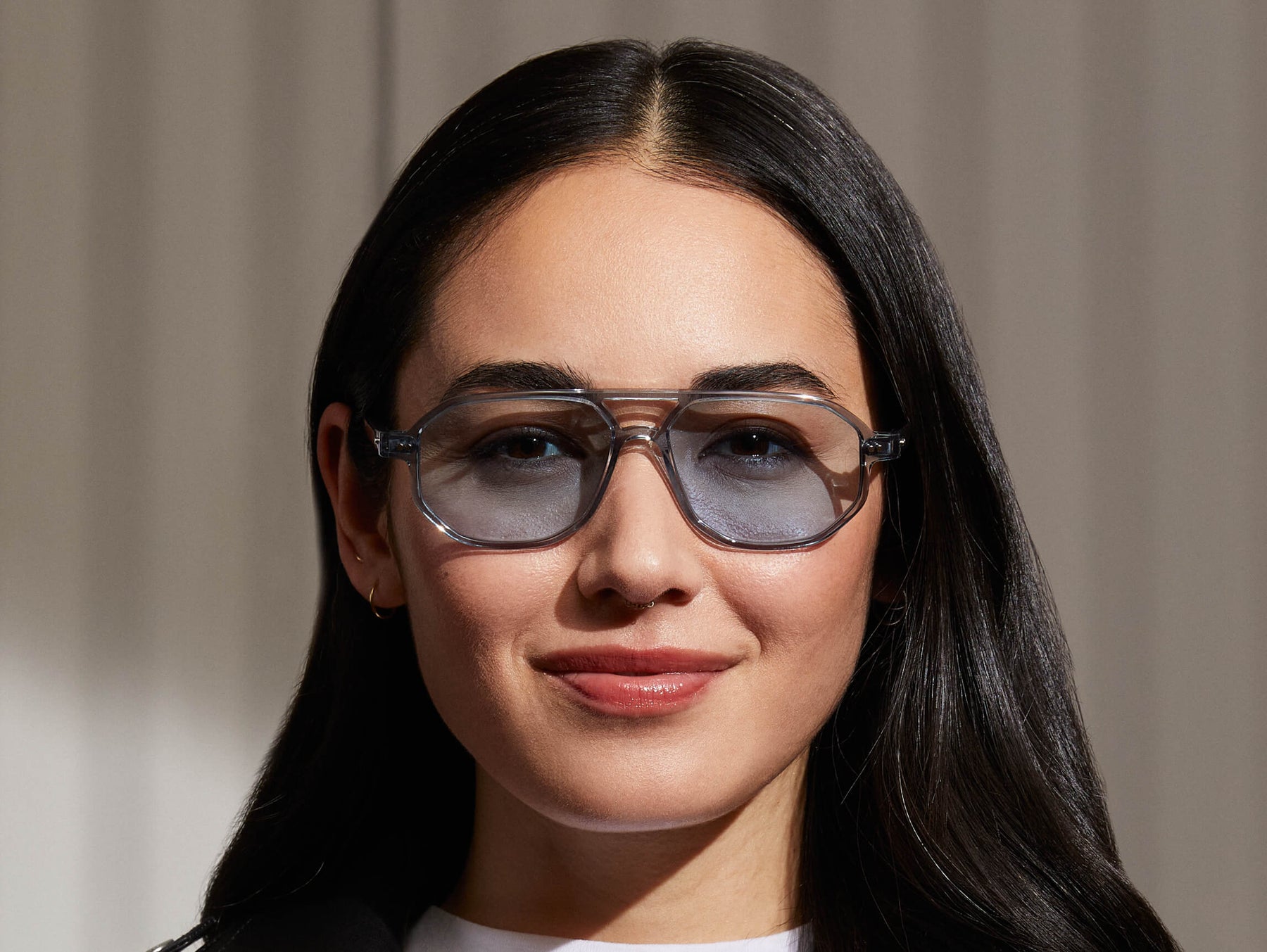 Model is wearing The GAZEEKTAL SUN in Light Blue in size 55 with Bel Air Blue Tinted Lenses