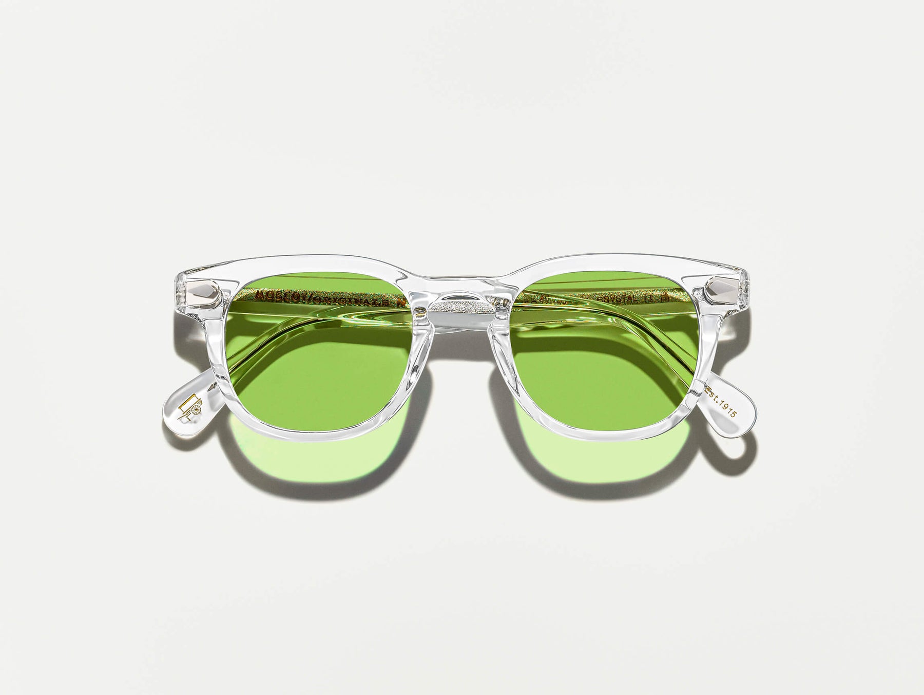 The GELT Crystal with Garnet Green Tinted Lenses