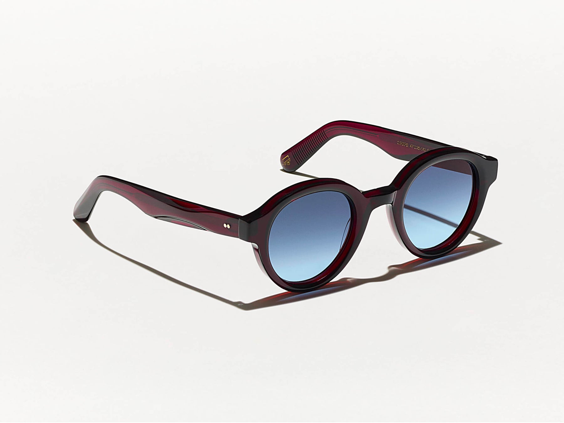 The GREPS SUN in Burgundy with Denim Blue Tinted Lenses