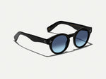 The GRUNYA SUN in Black with Denim Blue Tinted Lenses