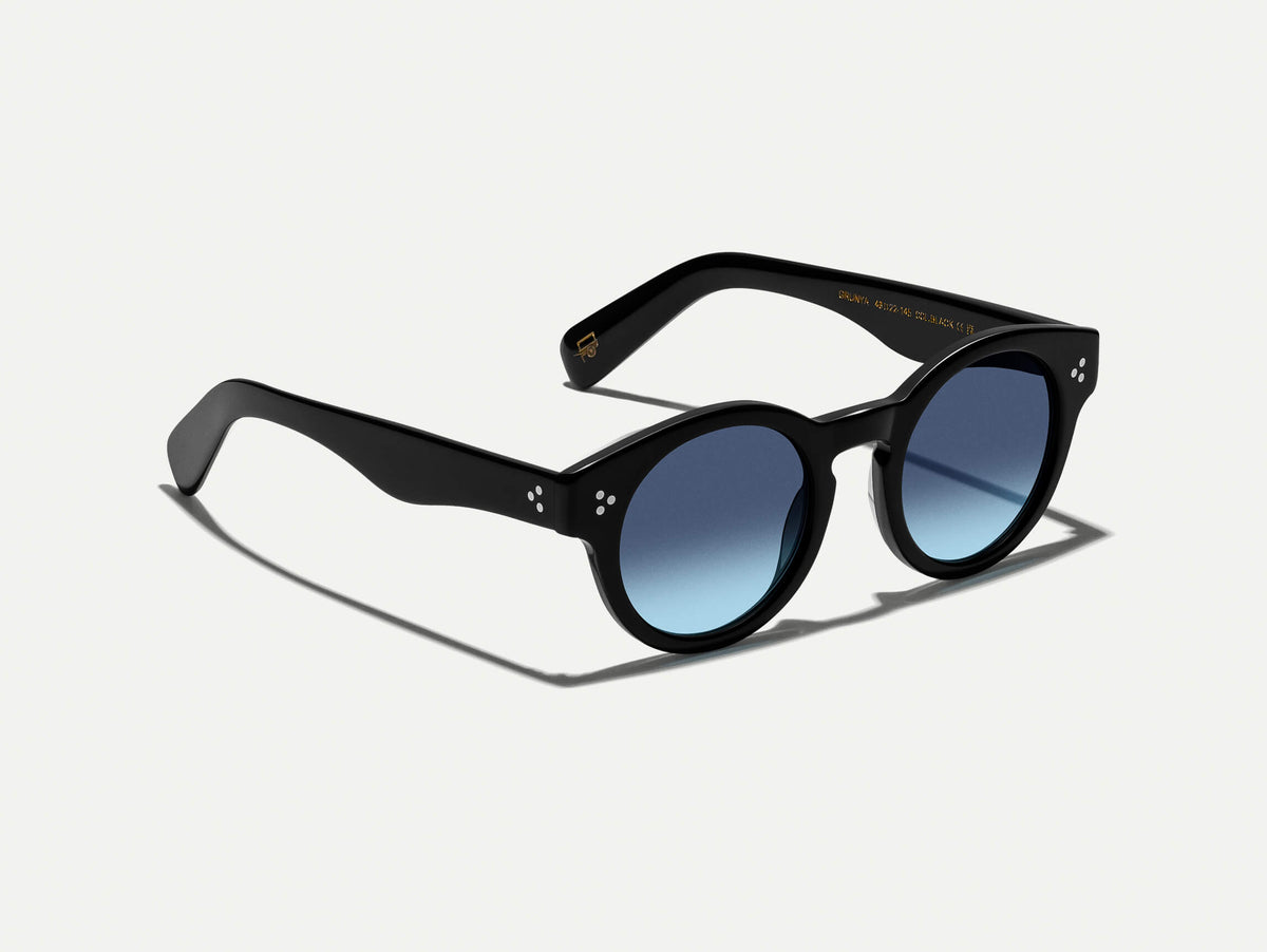 The GRUNYA SUN in Black with Denim Blue Tinted Lenses