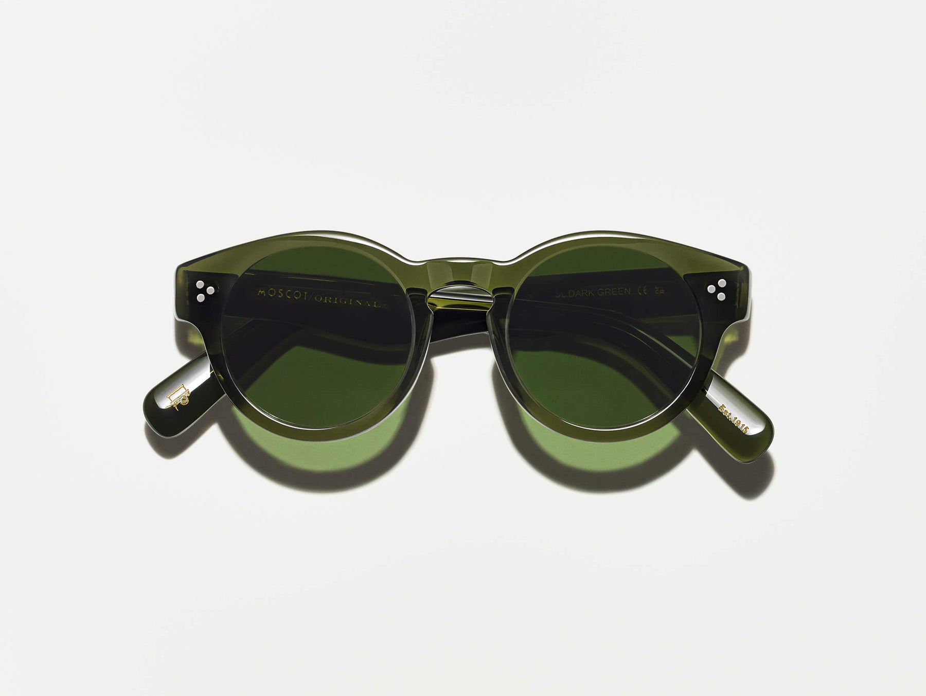The GRUNYA SUN in Dark Green with Calibar Green Glass Lenses
