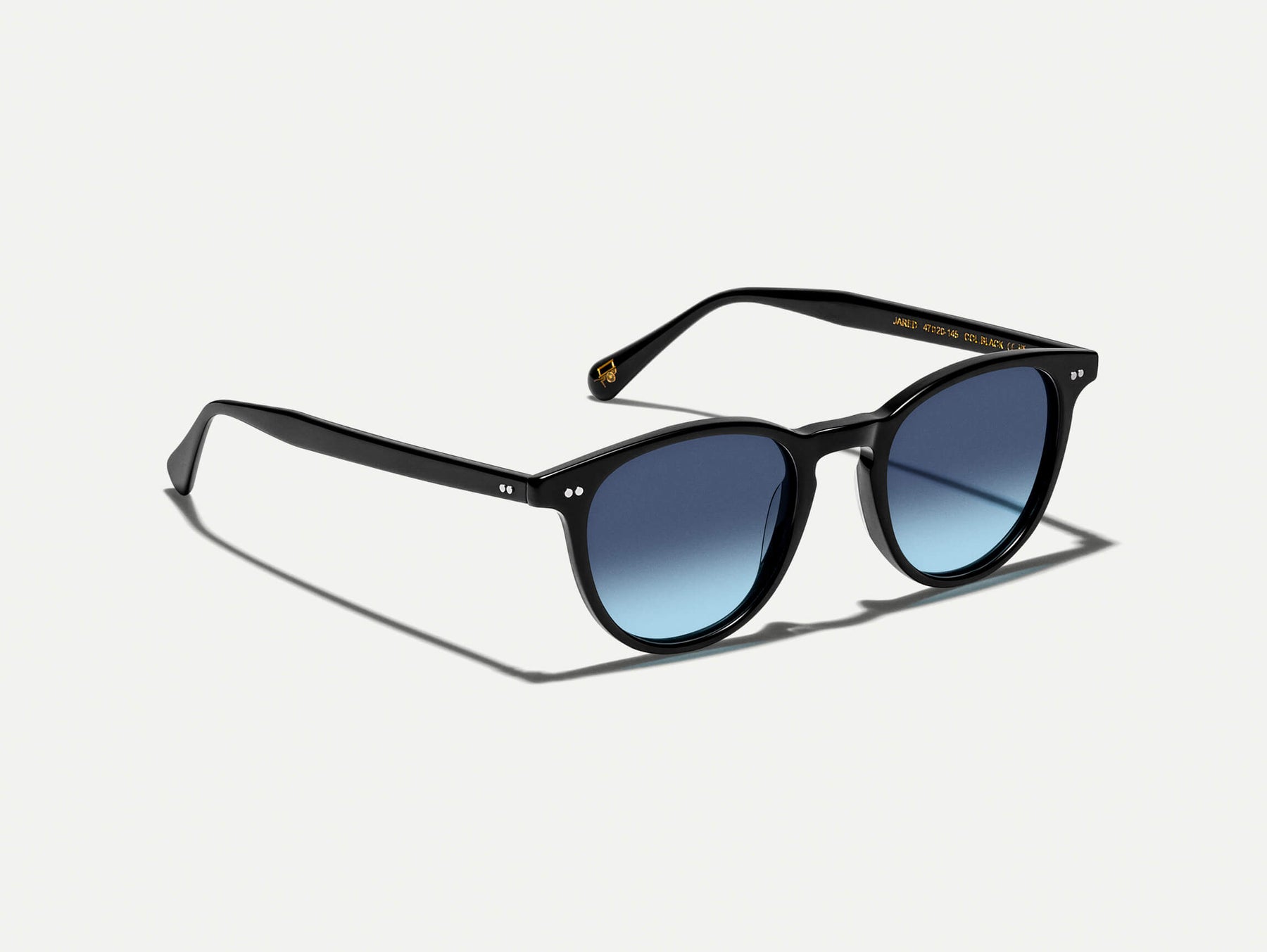 The JARED SUN in Black with Denim Blue Tinted Lenses
