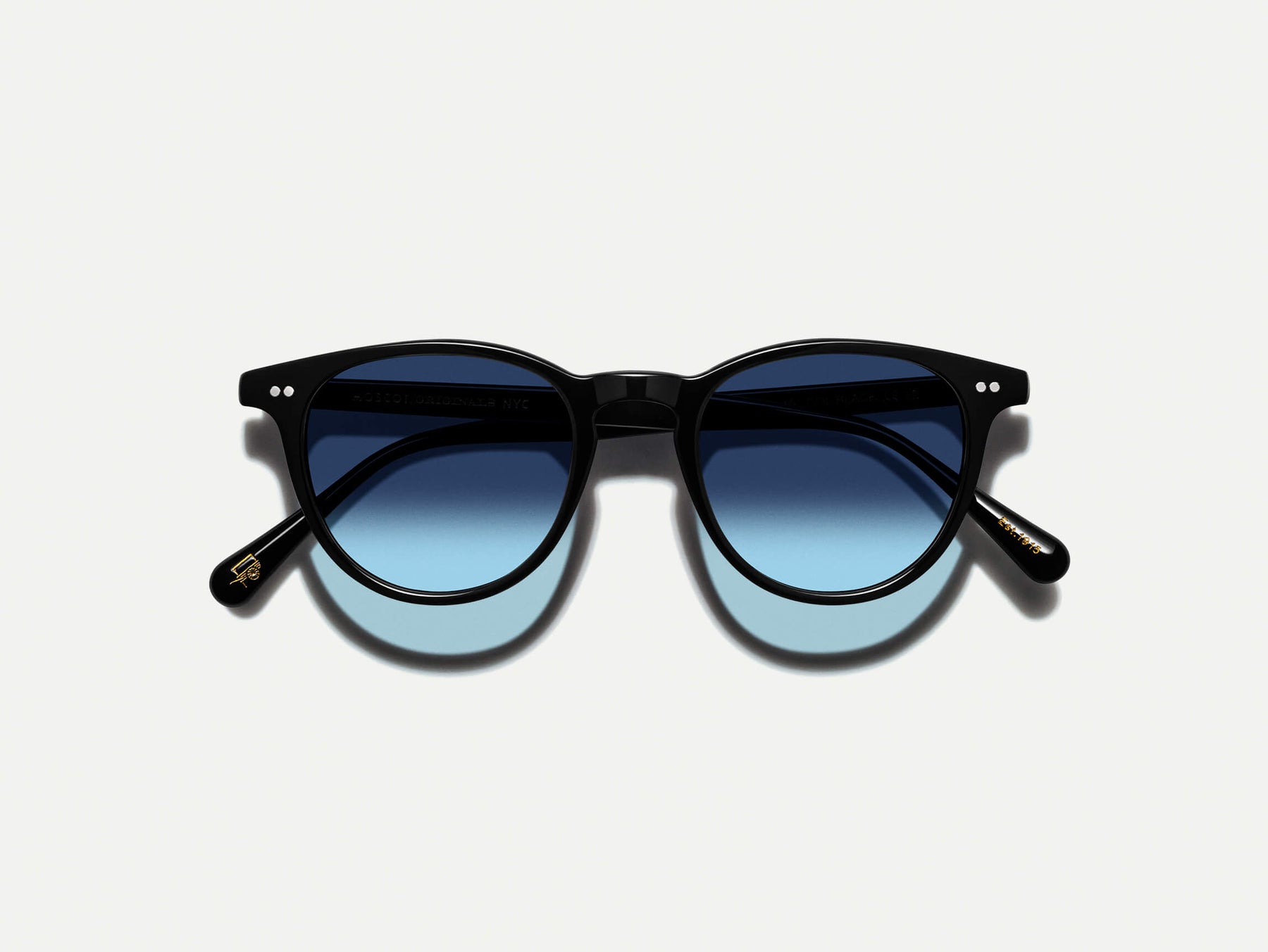 The JARED SUN in Black with Denim Blue Tinted Lenses