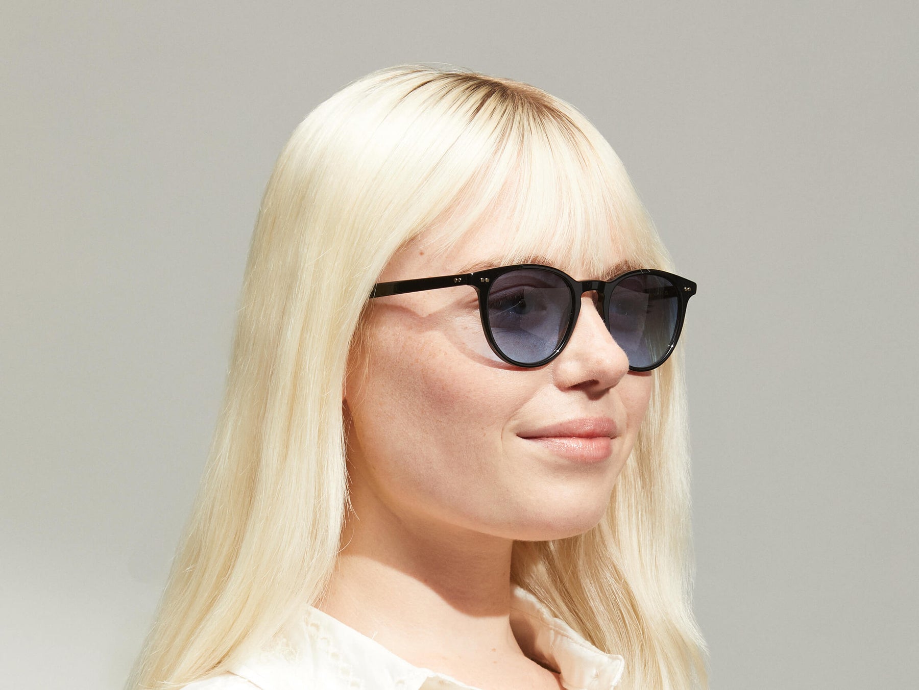 Model is wearing The JARED SUN in size 50 in Black with Denim Blue Tinted Lenses