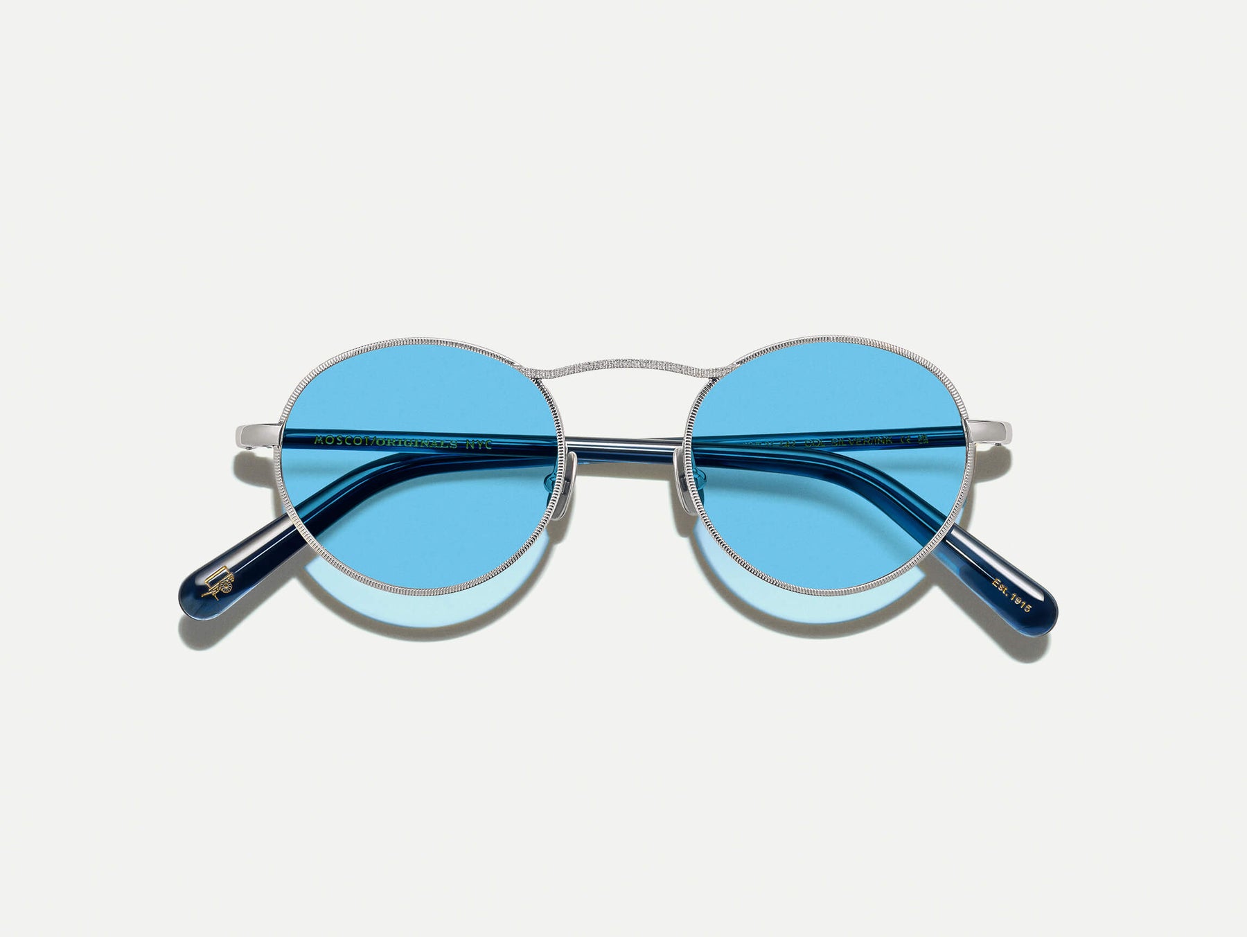 The KANAKA SUN in Silver/Ink with Celebrity Blue Tinted Lenses