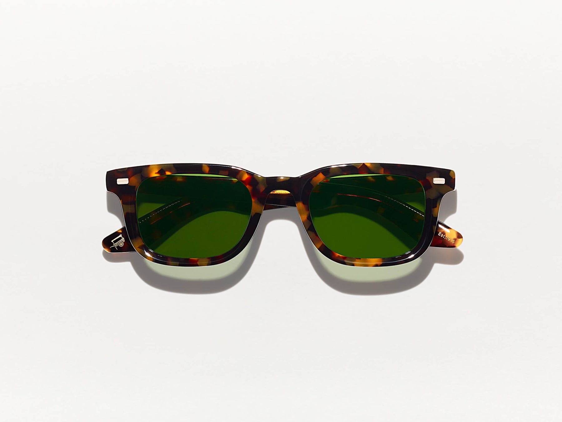 The KLUTZ SUN in Tortoise with Green Lenses