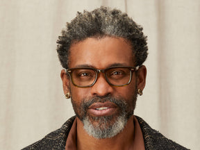 Model is wearing The KLUTZ in size 50 in Olive Brown