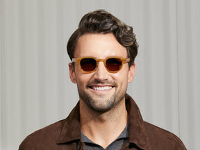 Model is wearing The LEMTOSH in Blonde size 46 with AMBER+ Tinted Lenses