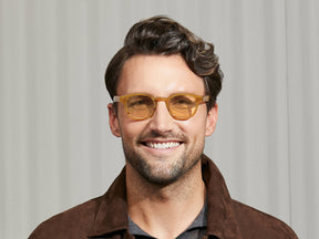 Model is wearing The LEMTOSH in Blonde size 46 with AMBER+ Tinted Lenses