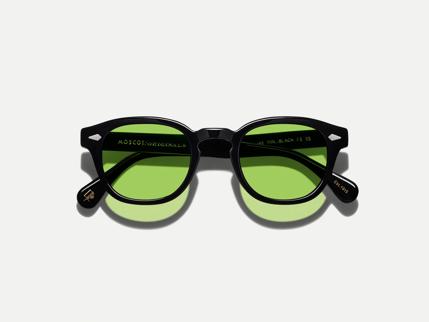 The LEMTOSH Black with Garnet Green Tinted Lenses