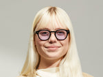 Model is wearing The LEMTOSH in Black in size 46 with Lavender Tinted Lenses