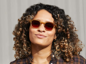 Model is wearing The LEMTOSH in Blonde in size 46 with Cabernet Tinted Lenses