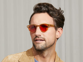 Model is wearing The LEMTOSH in Blonde in size 46 with Woodstock Orange Tinted Lenses